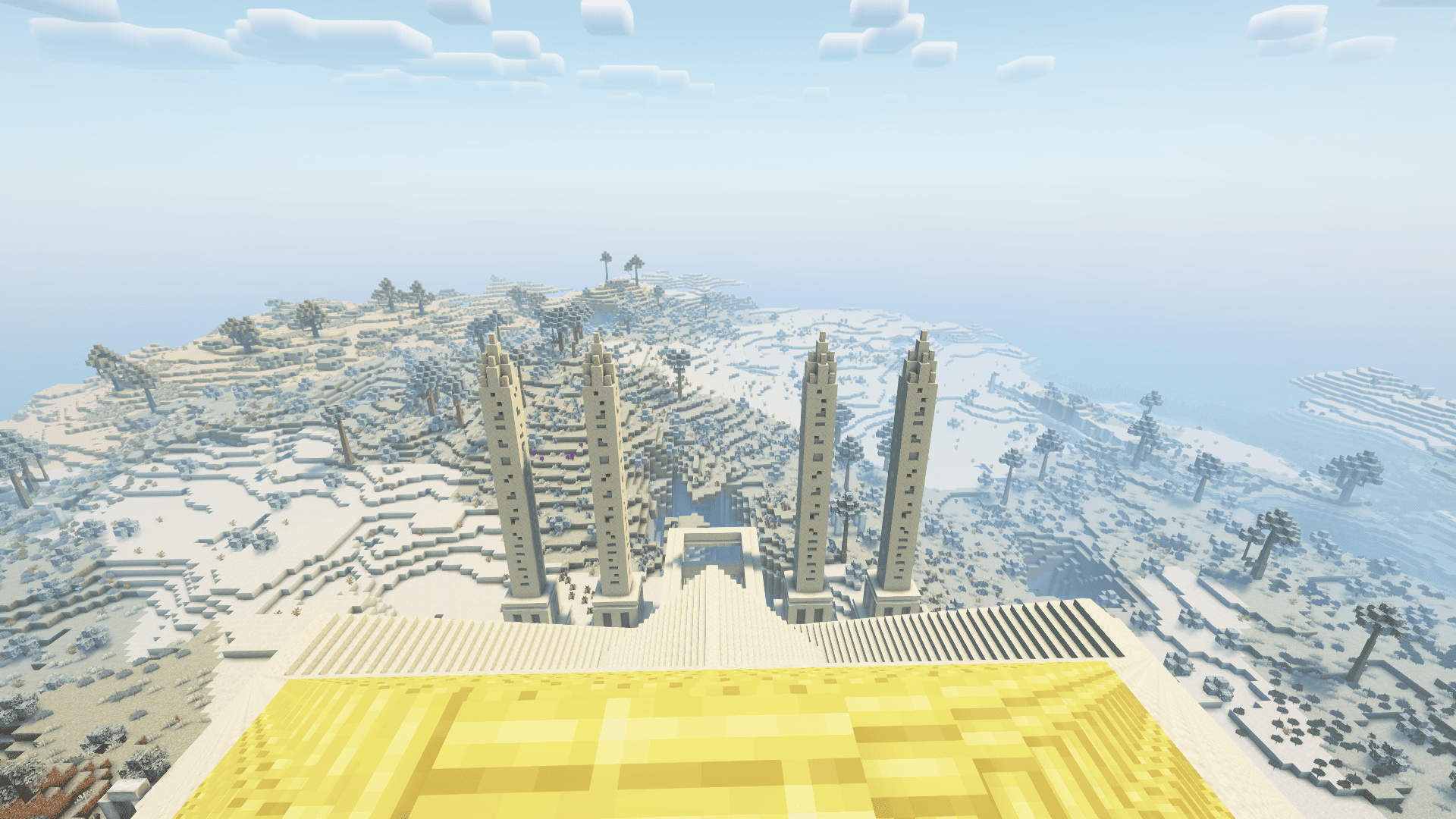 Estrutura dourada em região nevada de Minecraft